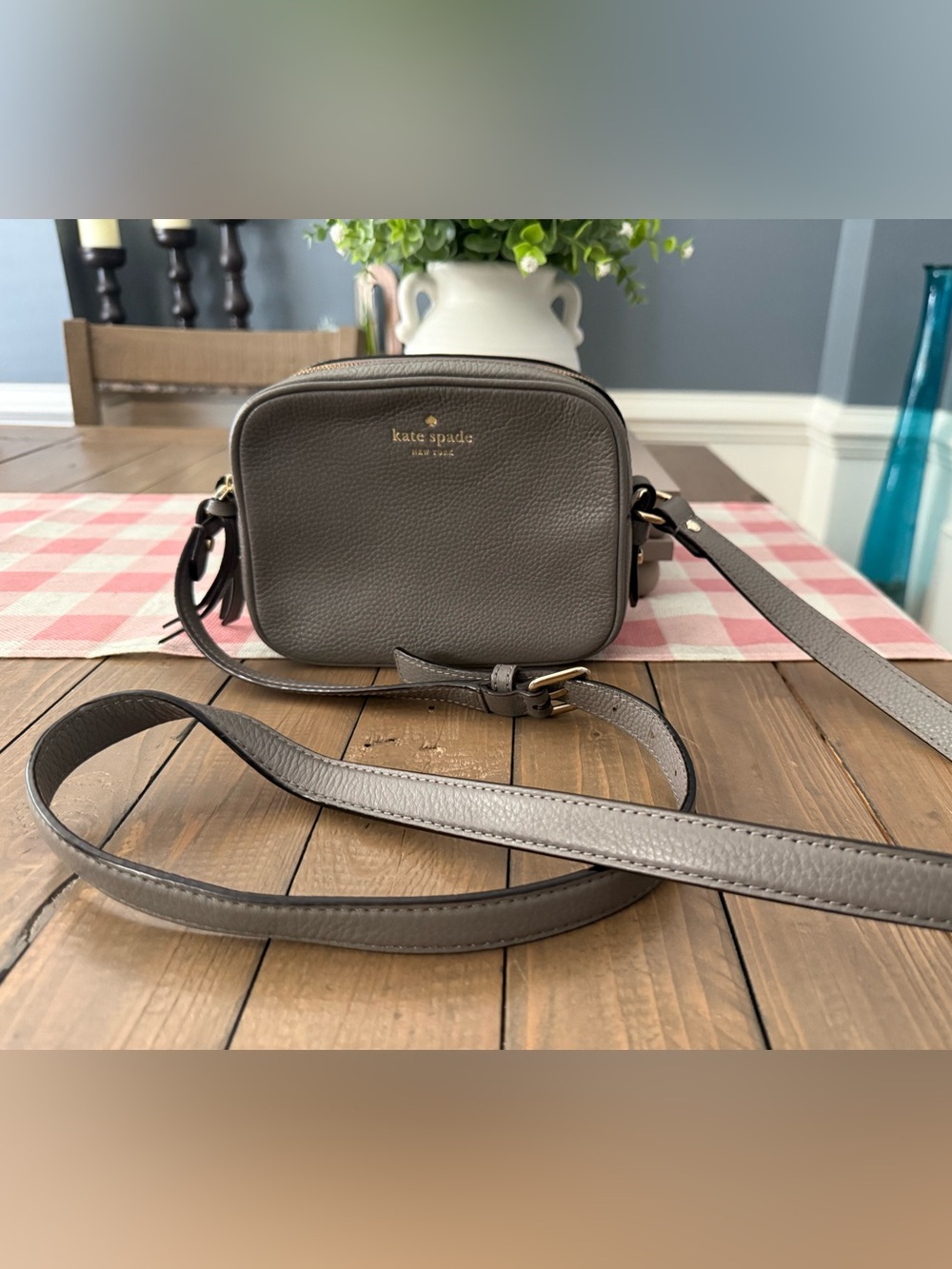 kate spade gray pebbled leather crossbody with gold logo